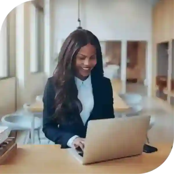 Woman working on laptop audit defense hero